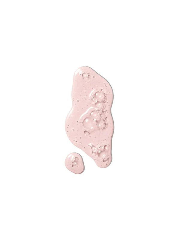 Close-up van de romige textuur van Darling Multi-Biotics Body Wash met rijke schuimvorming
