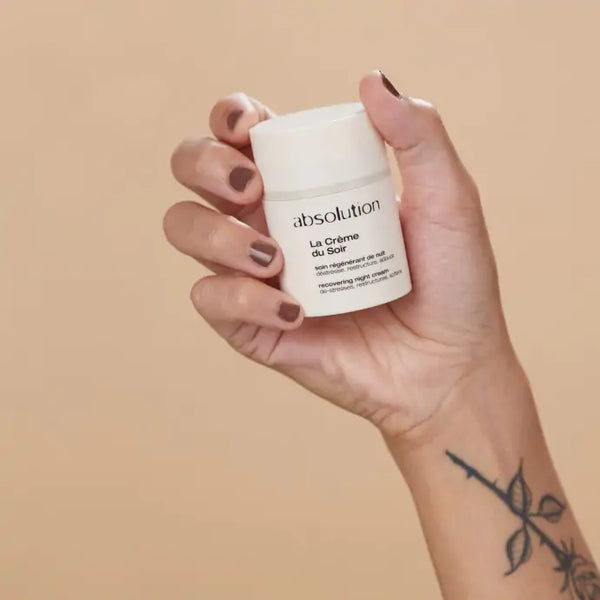 La Crème du Soir van Absolution in de hand voor een idee van formaat